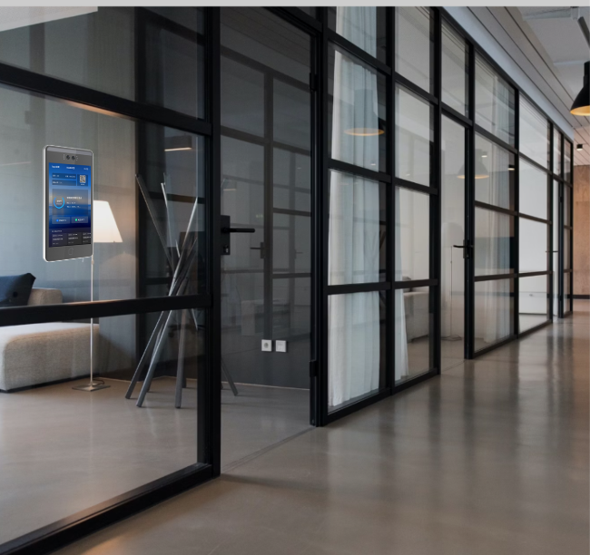 关键词：智慧办公，玻璃隔断，智能门禁，深圳市武智科技
        描述：深圳市武智科技智慧办公场景中的玻璃隔断区域，搭配智能门禁设备，提升办公空间的科技感与管理效率